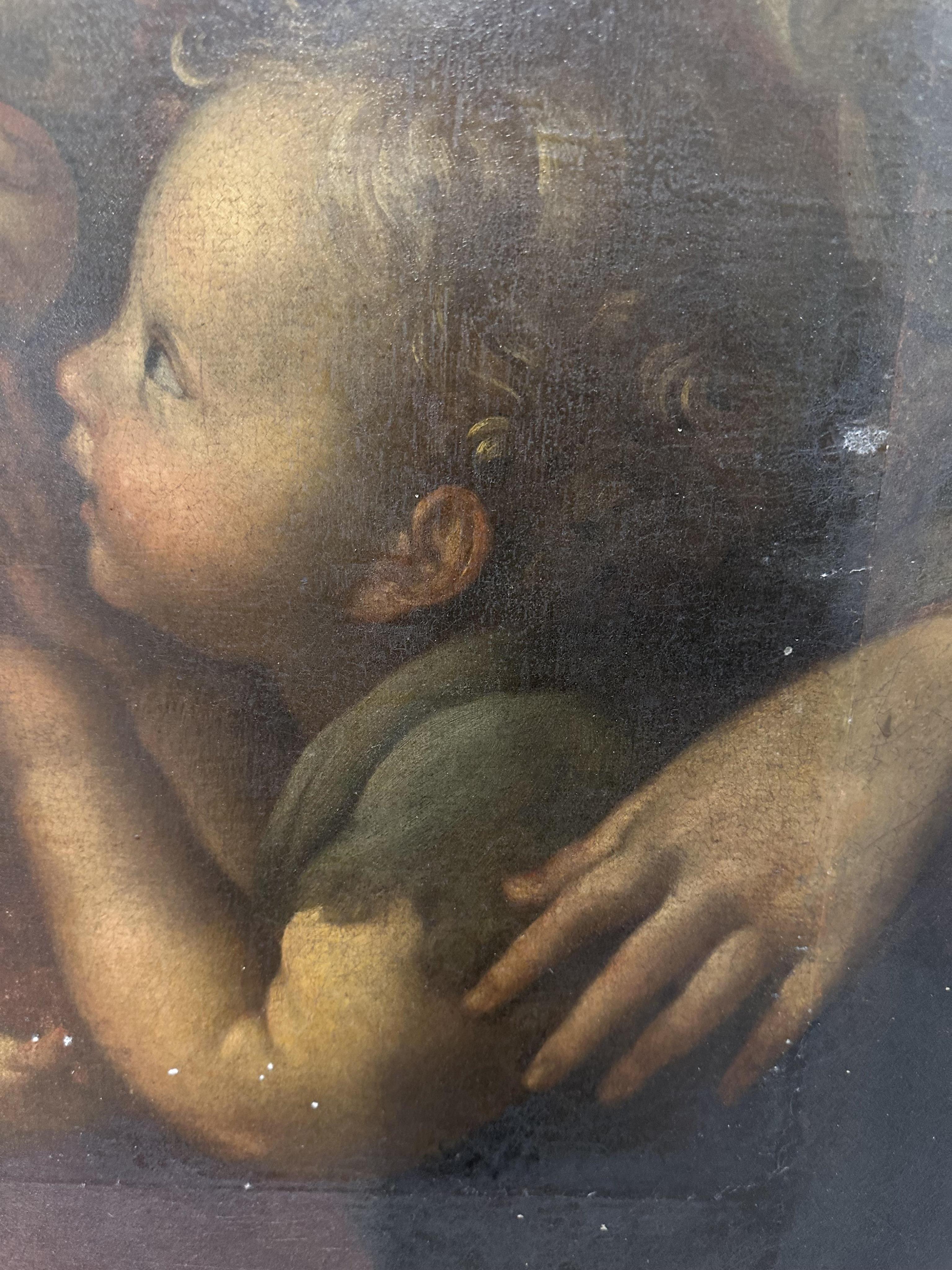 Circle of Domenico Zampieri, called il Domenichino, Italian 1581-1641, 'The Madonna and Child with the infant Saint John the Baptist and Angels'